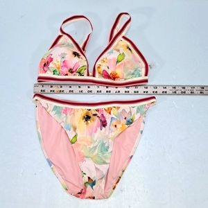 Cute pink floral bikini. Large size with adjustable straps. NWOT